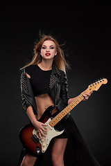 Image showing Beautiful girl playing guitar