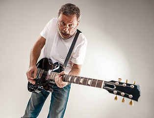 Image showing portrait of a guitar player 