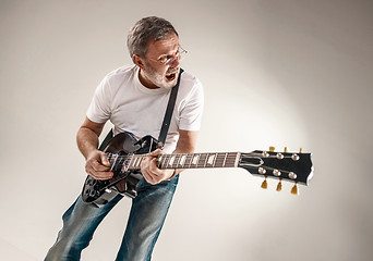 Image showing portrait of a guitar player 