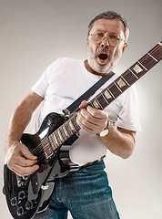 Image showing portrait of a guitar player 