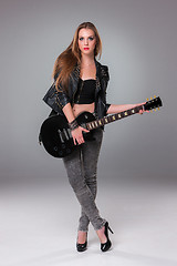 Image showing Beautiful girl playing guitar