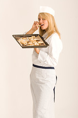 Image showing Chefs nibbles at your Christmas cookies