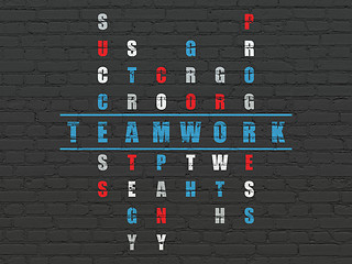 Image showing Business concept: word Teamwork in solving Crossword Puzzle
