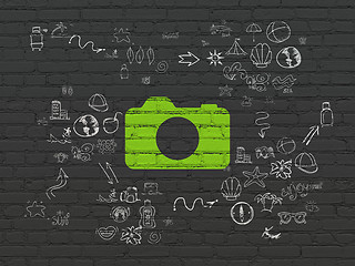 Image showing Vacation concept: Photo Camera on wall background