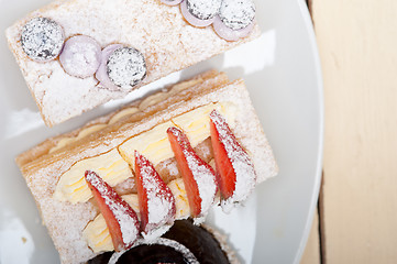 Image showing selection of fresh cream cake dessert plate 