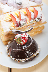 Image showing selection of fresh cream cake dessert plate 