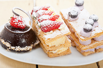 Image showing selection of fresh cream cake dessert plate 