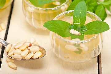 Image showing Arab traditional mint and pine nuts tea