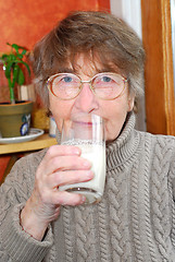 Image showing Woman glass milk