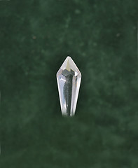 Image showing Glass crystal on green