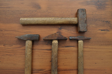 Image showing Hammer on wood