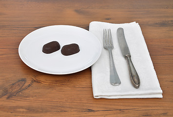 Image showing Chocolate candies on plate