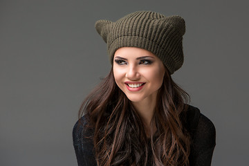 Image showing Beautiful sexy young woman in a  funny hat with ears