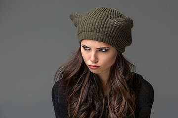 Image showing Beautiful sexy young woman in a  funny hat with ears