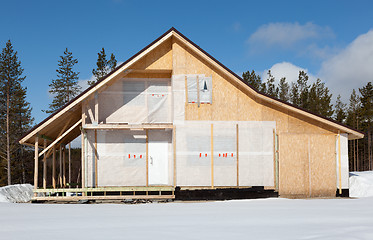 Image showing Construction cottage in the forest area