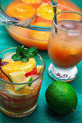 Image showing freshly squeezed juice from tropical fruits