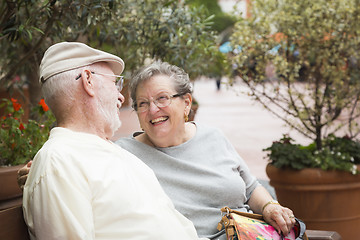 Image showing Senior Couple on Bench in the Market Place