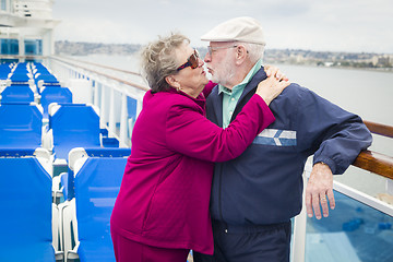 Image showing Senior Couple Kissing on Deck of Cruise Ship