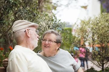 Image showing Senior Couple on Bench in the Market Place