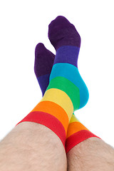 Image showing man legs in colorful funny socks - isolated