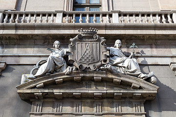 Image showing Two maidens on the facade of an old building