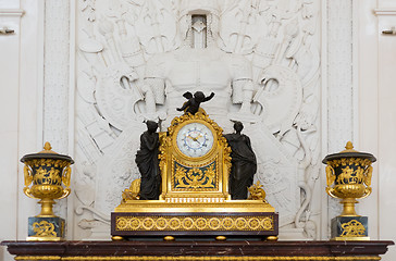 Image showing Antique clock in gold case in the interior Hermitage Museum