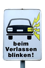 Image showing traffic sign beim Verlassen blinken