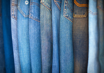 Image showing Blue-Jeans in Various Shades of Blue, Arranged on Display.