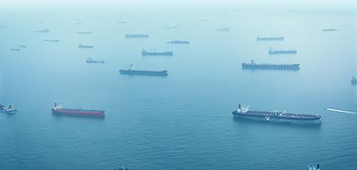 Image showing Aerial Shot of Commercial Ships at Anchor off Singapore