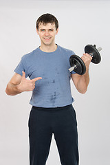 Image showing athlete with a positive indicates dumbbell