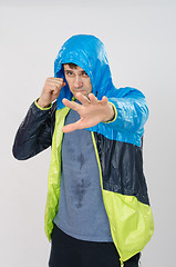 Image showing Man in sportswear ready to hit