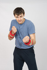 Image showing Athlete fulfills punches with the weighting