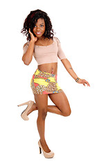 Image showing Young African woman in skirt.