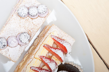 Image showing selection of fresh cream cake dessert plate 