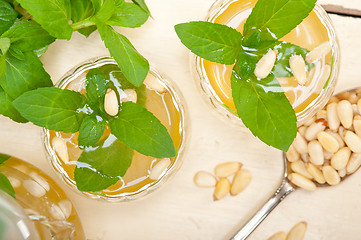 Image showing Arab traditional mint and pine nuts tea