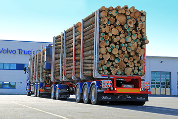 Image showing Volvo FH16 700 Logging Truck on a Yard, Back View