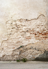 Image showing abandoned grunge cracked brick stucco wall