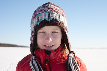 Image showing young girl in knitted cap