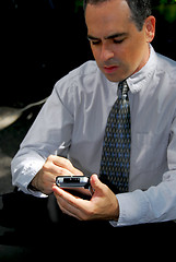 Image showing Businessman pda