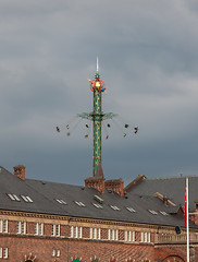 Image showing The fairground fun fair in tivoli gardens. Copenhagen, Denmark, on a gray sky