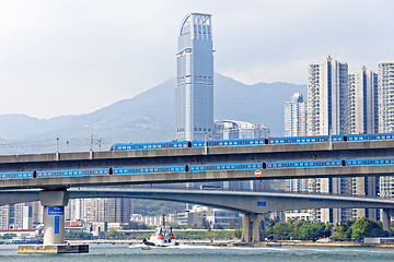 Image showing high speed train on bridge in hong kong downtown city