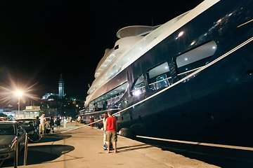 Image showing People sightseeing moored yacht in Rovinj