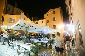 Image showing Tourists sitting in restaurant 