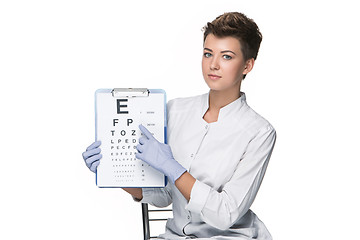 Image showing young woman ophthalmologist with eye chart