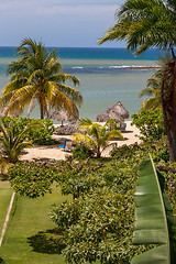 Image showing tropical garden and  the ocean beach