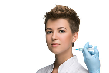 Image showing pretty young woman and vaccine syringe