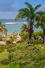 Image showing tropical garden and  the ocean beach