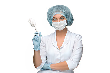 Image showing Portrait of lady surgeon holding surgical instrument over white background