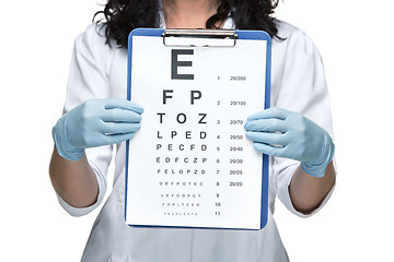 Image showing male ophthalmologist with eye chart
