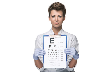 Image showing young woman ophthalmologist with eye chart